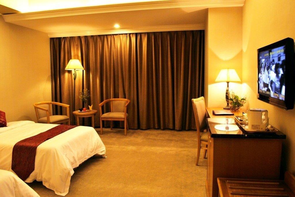Guangzhou New Century Hotel Zimmer foto