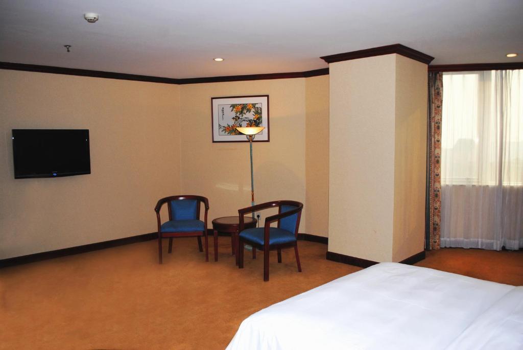 Guangzhou New Century Hotel Zimmer foto